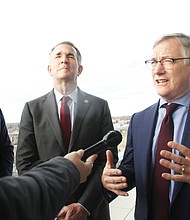 Andrew C. Florance, right, founder, president and chief executive officer of CoStar, talks with members of the media Dec. 17 about the planned $460 million expansion of the company’s campus in Richmond. Joining him are Richmond Mayor Levar M. Stoney, left, and Gov. Ralph S. Northam.