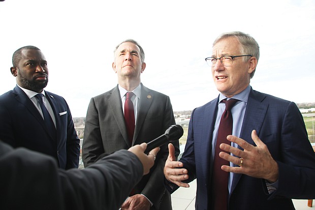 Andrew C. Florance, right, founder, president and chief executive officer of CoStar, talks with members of the media Dec. 17 about the planned $460 million expansion of the company’s campus in Richmond. Joining him are Richmond Mayor Levar M. Stoney, left, and Gov. Ralph S. Northam.