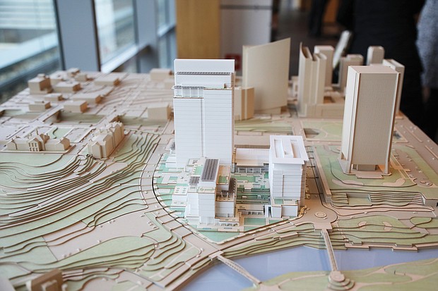 A model shows the 26-story new office tower CoStar plans for the riverfront at 5th and Tredegar streets in Downtown, across from Brown’s Island. The firm already has a nine-story building at 501 S. 5th St., where the Dec. 17 announcement was held.