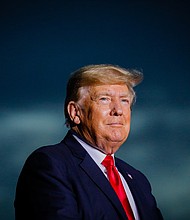 Former President Donald Trump, seen here on July 3, in Sarasota, Florida, is suing New York Attorney General Letitia James to stop investigation into his company.
Mandatory Credit:	Eva Marie Uzcategui/Getty Images