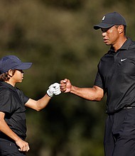 Tiger Woods is competing with his 12-year-old son, Charlie, in the $1 million PNC Championship at the Ritz-Carton Golf Club Orlando, Grande Lakes in Florida.
Mandatory Credit:	Douglas P. DeFelice/Getty Images