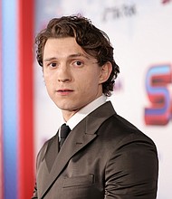 Tom Holland, here on December 13, says he would be open to hosting the Oscars if asked.
Mandatory Credit:	Amy Sussman/Getty Images