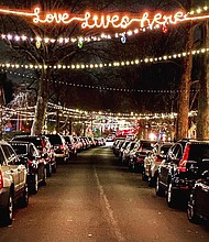 Neighbors connect their holiday lights on Dunkirk Rd. in Towson, MD. The tradition started in 2020 with 32 houses joining in.
Matt Riggs