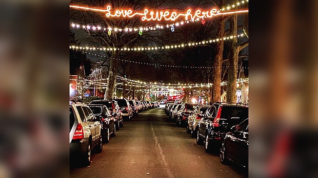 Neighbors connect their holiday lights on Dunkirk Rd. in Towson, MD. The tradition started in 2020 with 32 houses joining in.
Matt Riggs