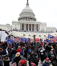 The Justice Department released a three-hour video of a battle between rioters and the police at the US Capitol Building on January 6 where rioters brandished weapons, officers were viciously beaten, and a member of the mob died on Capitol steps.
Mandatory Credit:	Tasos Katopodis/Getty Images
