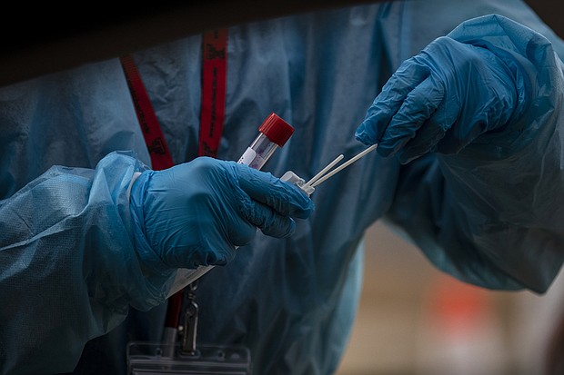 The US Centers for Disease Control and Prevention is shortening the isolation time for health care workers who test positive for Covid-19.
Mandatory Credit:	Chet Strange/Bloomberg/Getty Images