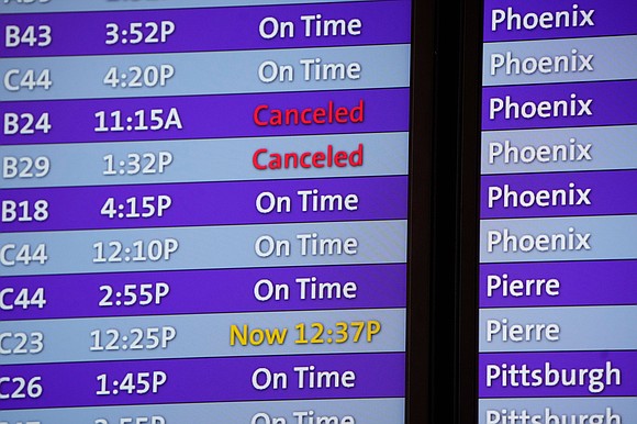 More than 2,000 flights have been canceled Monday as Covid cases surge across the globe.