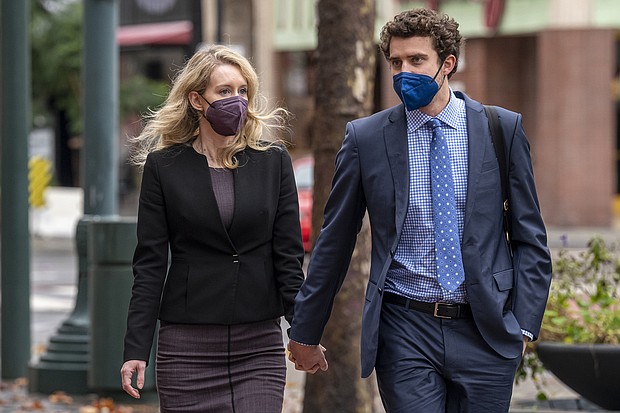 The jury in the Elizabeth Holmes trial fails to reach a verdict for second straight week. Holmes (left), is seen here in San Jose, California on December 23.
David Paul Morris/Bloomberg/Getty Images