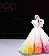 Misia in Koizumi-designed dress performing at the Tokyo 2020 Opening Wu Tomo Zhizhao-Getty