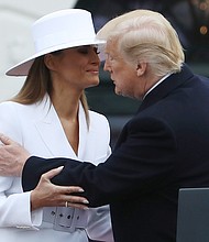 Melania Trump announced Tuesday morning that she is holding an auction of the white hat she wore during the visit of the French first family, the Macrons, to the White House in 2018.
Mandatory Credit:	Mark Wilson/Getty Images