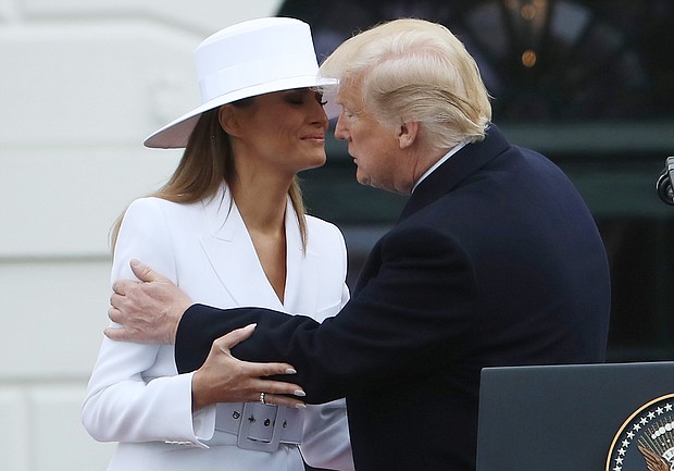Melania Trump announced Tuesday morning that she is holding an auction of the white hat she wore during the visit of the French first family, the Macrons, to the White House in 2018.
Mandatory Credit:	Mark Wilson/Getty Images