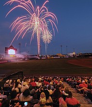 More than 9,000 people watch a colorful fireworks display at The Diamond on July 3 following the Richmond Flying Squirrels’ Fourth of July weekend home stand against the Binghamton Rumble Po- nies of New York.