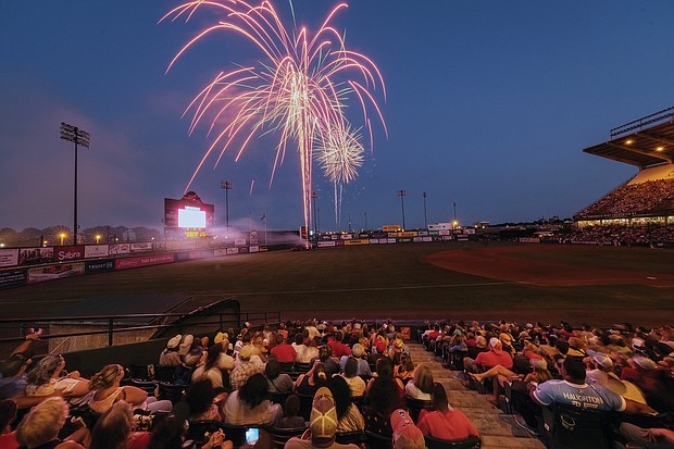 More than 9,000 people watch a colorful fireworks display at The Diamond on July 3 following the Richmond Flying Squirrels’ Fourth of July weekend home stand against the Binghamton Rumble Po- nies of New York.