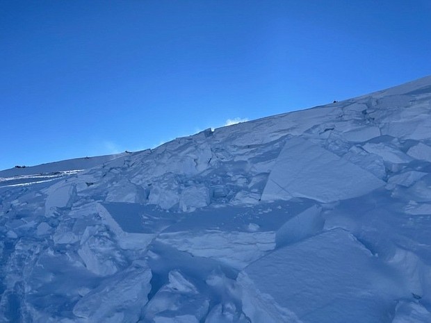 The scene at the North Star Mountain, northwest of Hoosier Pass, after a January 8 avalanche buried two snowshoers and their dog, killing them all.
	Summit County Rescue Group/KCNC
