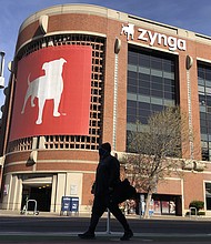 Take-Two said Monday it is buying Zynga in a cash-and-stock deal valued at $12.7 billion, including debt. The deal values Zynga at $9.86 a share.
Jeff Chiu/AP