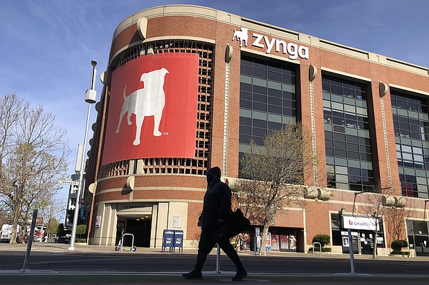 Take-Two said Monday it is buying Zynga in a cash-and-stock deal valued at $12.7 billion, including debt. The deal values Zynga at $9.86 a share.
Jeff Chiu/AP