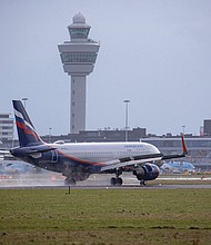 In Europe, the latest generation of high speed mobile networks is being rolled out without a hitch, and pictured, Russian Airlines Airbus A320 aircraft in Amsterdam, the Netherlands on January 5.
Mandatory Credit:	Nicolas Economou/NurPhoto/AP
