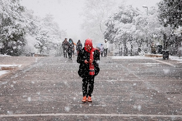 Snow falling in the center of Athens, Greece on January 24.
Mandatory Credit:	Nikolas Kokovlis/NurPhoto/AP