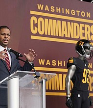 Washington Commanders President Jason Wright speaks during an event to unveil the NFL football team’s new identity Wednesday in Landover, Md. The new name comes 18 months after the once-storied franchise dropped its old moniker following decades of criticism that it was offensive to Native Americans.