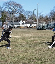 A group of John Marshall High School football players take advantage of a cold Sunday afternoon the week before Super Bowl LVI to play a game at Hotchkiss Field Community Center in North Side. No final score was provided, but the free game was cheaper entertainment than this weekend’s big event at SoFi Stadium outside Los Angeles.