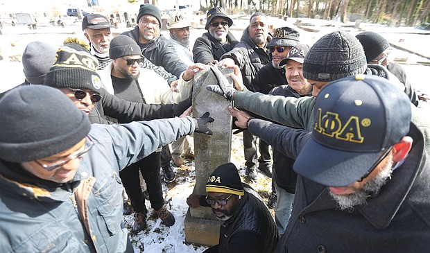 Members of the Virginia Association of Chapters of Alpha Phi Alpha Fraternity gather recently at Evergreen Cemetery at the family gravesite of Joseph Endom Jones and Rosa Kinckle Jones, parents of one of Alpha Phi Alpha Fraternity’s seven founders, Eugene Kinckle Jones. The Jones family, which had long associations with schools that became part of Virginia Union University, lived in Richmond in the late 1880s and early 1900s.