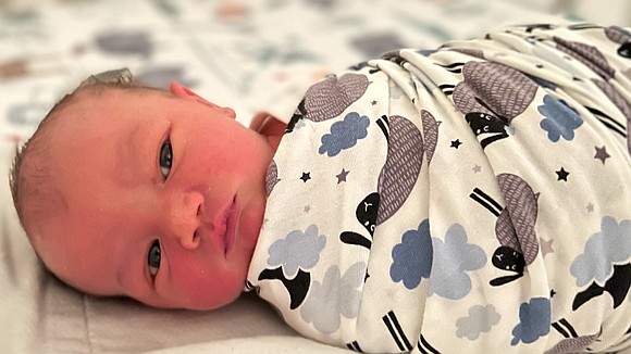 CNN anchor Anderson Cooper announced the birth of his second son on Thursday's "AC360" broadcast.