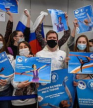 Supporters of Valieva await the figure skater's arrival at the Sheremetevo airport outside Moscow.
Mandatory Credit: Alexander Nemenov/AFP/Getty Images