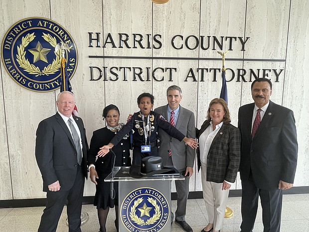 DJ with Asst. Chief Investigator Trina Burkes, Chief Investigator Robert Jackson, Asst. District Attorney Eric Kugler, District Attorney Kim Ogg and C.O. Bradford, who is the Harris County DA Office’s Law Enforcement Liaison and former Chief of the Houston Police Department.