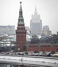 A picture taken on February 1 shows the Vodovzvodnaya Tower of the Kremlin and the Ministry of Foreign Affairs of Russia's building in Moscow. The US has written to the top United Nations human rights official that it has "credible information" that Russian forces are identifying Ukrainians "to be killed or sent to camps" if it further invades Ukraine and occupies it.
Mandatory Credit:	Natalia Kolesnikova/AFP/Getty Images
