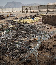 A bill to help veterans suffering from toxic burn pit exposure takes a key step forward in Congress. Pictured is a burn pit in March 2013 in Kandahar Province, Afghanistan.
Mandatory Credit:	Andrew Burton/Getty Images
