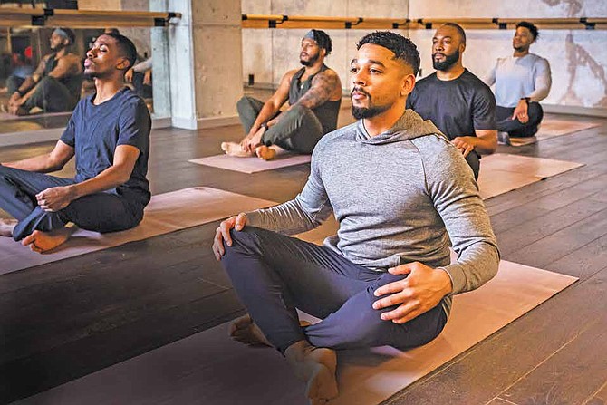 Tristan Lewis and Andrew Smith created The Healing, with the mission to normalize
mental health and wellness in Black men, using yoga to start the conversation.
PHOTOS PROVIDED BY SAMANTHA FLYNN