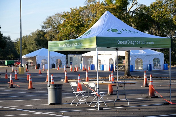 Tents used for Covid-19 testing are viewed in the parking lot of a Quest Diagnostics facility during a new coronavirus pandemic, Friday, Feb. 11, in Tampa.
Mandatory Credit:	Phelan M. Ebenhack via AP