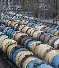 Rail wagons for oil, fuel and liquefied gas cargo stand in sidings at Yanichkino railway station, cose to the Gazprom Neft PJSC Moscow refinery in Moscow, Russia, on Monday, April 27, 2020.
Mandatory Credit:	Andrey Rudakov/Bloomberg/Getty Images