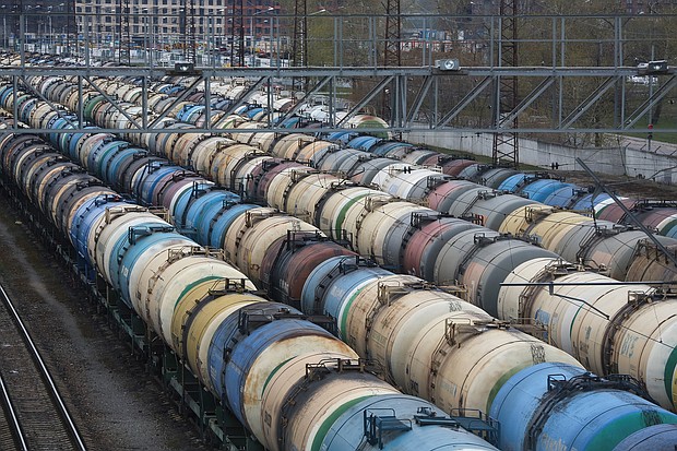 Rail wagons for oil, fuel and liquefied gas cargo stand in sidings at Yanichkino railway station, cose to the Gazprom Neft PJSC Moscow refinery in Moscow, Russia, on Monday, April 27, 2020.
Mandatory Credit:	Andrey Rudakov/Bloomberg/Getty Images