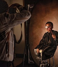Christina Smith photographs Ayden Smith, 9, for her Black History Month portrait project in Battle Creek, Mich., on Feb. 11. Ayden was costumed as the late U.S. Supreme Court Justice Thurgood Marshall. In 1967, he became the first Black on the nation’s highest court.