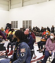 City Council President Cynthia I. Newbille, left, and School Board member Cheryl L. Burke facilitate the community discussion about stemming gun violence at a meeting held Feb. 24 at the Powhatan Community Center on Fulton Hill.