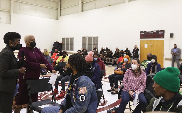 City Council President Cynthia I. Newbille, left, and School Board member Cheryl L. Burke facilitate the community discussion about stemming gun violence at a meeting held Feb. 24 at the Powhatan Community Center on Fulton Hill.