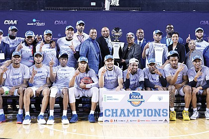 The Fayetteville State University Broncos pose with the CIAA Tournament trophy after clinching the conference title during last Saturday’s finale in Baltimore. It was Fayetteville State’s first CIAA title since 1973.