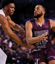 Virginia Union University forward Robert Osborne pushes to get past a Fayetteville State University defender during last Saturday’s CIAA Tournament finale in Baltimore. Osborne scored 25 points during the game, an ultimate 65-62 heartbreaking loss for the VUU Panthers.