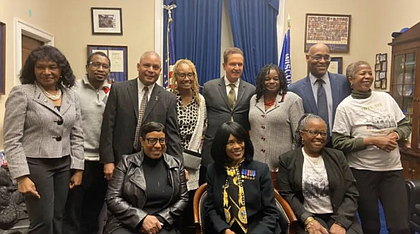Back row from left to right: Edna W. Cummings (Colonel Ret.) (standing), Chris Goldson, Rodger Murphy Matthews (LTC Colonel Ret.), (son of Vashti Murphy Matthews and 6888 veteran), Natalie Durham (daughter of 6888 veteran Maybelle Campbell), Rep. Brian Higgins (D-NY) and Rep. Gwen Moore (D-WI), Stanley Early (son of 6888 Commander Charity Adams), Elizabeth Helm Frazier are just some of the people who helped the women of 6888th receive official honors. Front Row: Melody Campbell (daughter of Maybelle Campbell), Betty Schuler (daughter of Vashti Muphy Matthews) center front seated; Janice Martin (daughter of 6888 veteran Indiana Hunt-Martin) (Courtesy Photo)