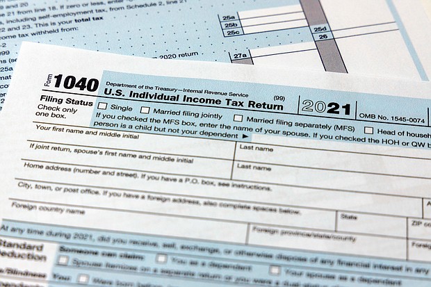 Confusion. Amnesia. New paperwork. Delays getting through to the IRS. These are some of the top pandemic-induced frustrations marking this tax filing season, both for tax preparers and their clients.
Mandatory Credit:	Jon Elswick/AP