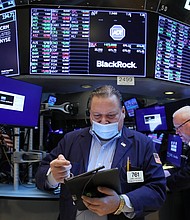Traders work on the floor of the New York Stock Exchange (NYSE) on March 8 in New York City. The Dow was up slightly in morning trading as the Russian invasion of Ukraine continues to unsettle global markets.
Mandatory Credit:	Spencer Platt/Getty Images