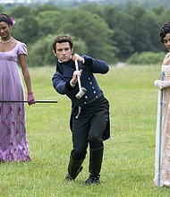 Simone Ashley as Kate Sharma, Jonathan Bailey as Anthony Bridgerton, Charithra Chandran as Edwina Sharma in season 2 of "Bridgerton."
Mandatory Credit:	LIAM DANIEL/NETFLIX