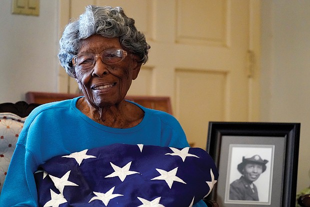World War II veteran Maj. Fannie Griffin McClendon, a member of the World War II 6888th Central Postal Directory Battalion, poses June 10, 2021, at her home in Tempe, Ariz. The battalion that made history as the only all- female, Black unit to serve in Europe during WWII is set to be honored by Congress with the Congressional Gold Medal.