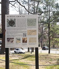 Congressman A. Donald McEachin, sponsor of a bipartisan bill to provide $3 million in federal funding for historic Black cemeteries, views the burial site for an unknown number of enslaved people located near Westhampton Lake on what is now the campus of the University of Richmond. The land, acquired by the university in 1910, had been part of a plantation.