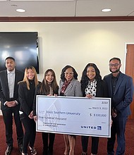 Texas Southern University President Lesia Crumpton-Young (center) stands with TSU aviation students (l. to r.) Jacorey Adams, Lubianka Lanza, Katherine Cabrera, Brionne Nixon and Farhan Ahmed. These students received support from a $50,000 per year scholarship that United Airlines has provided to the University, along with mentorship activities with United professionals.