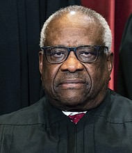 Associate Justice Clarence Thomas, seen here last year, missed a third day of oral arguments on March 23 after being hospitalized to receive treatment for what a court spokesperson described as an infection.
Mandatory Credit:	Erin Schaff/The New York Times/Pool