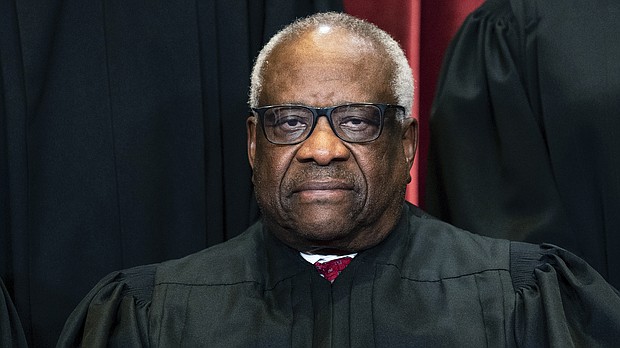 Associate Justice Clarence Thomas, seen here last year, missed a third day of oral arguments on March 23 after being hospitalized to receive treatment for what a court spokesperson described as an infection.
Mandatory Credit:	Erin Schaff/The New York Times/Pool