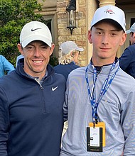 Mykhailo Golod (R) with professional golfer Rory McIlroy during the Players Championship in Ponte Vedra Beach, Florida, on March 14.
Mandatory Credit:	PGA Tour