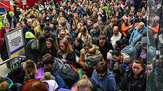 People who fled the war in Ukraine board a humanitarian train in Krakow, Poland, that's bound for Berlin on March 17.
Mandatory Credit:	Omar Marques/Getty Images